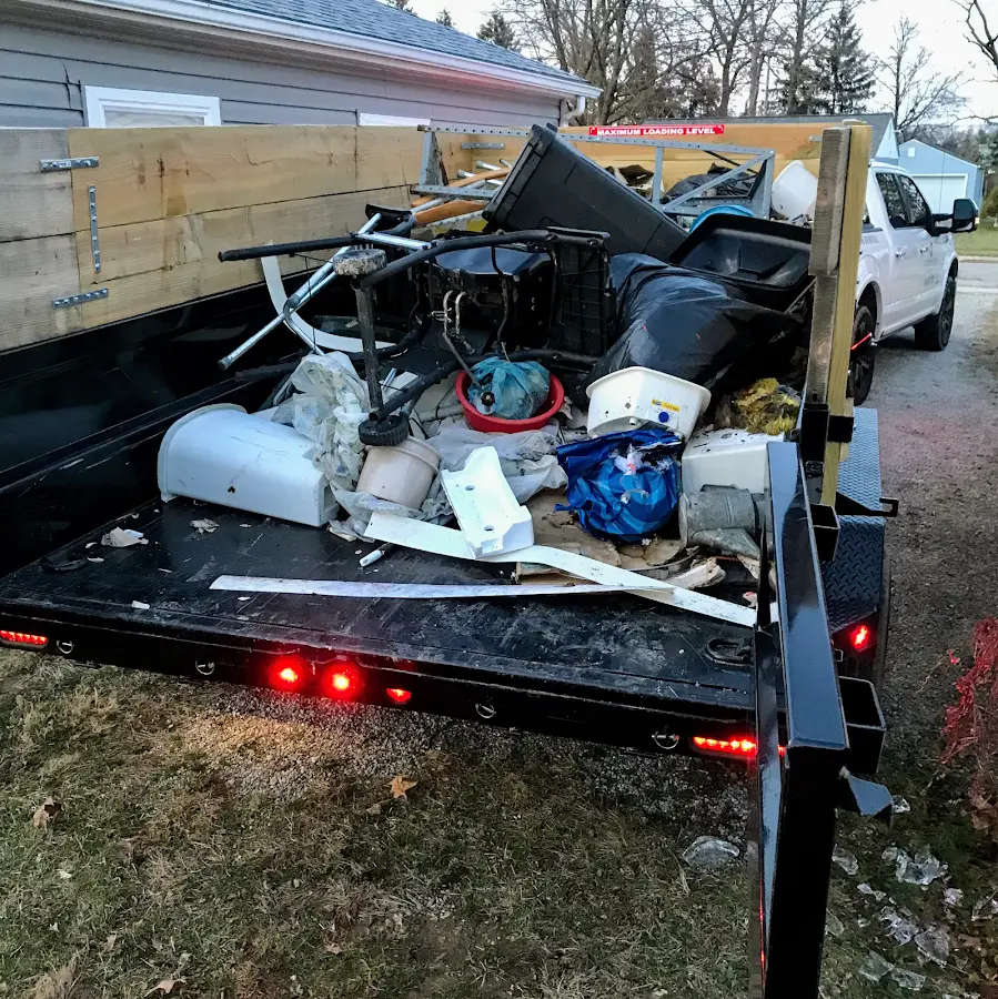 Roll-off dumpster delivered to a residential driveway in Alva